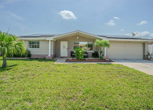 Property at 1118 Lodestar Dr, Holiday, FL 34690, 3 beds, 2.5 baths