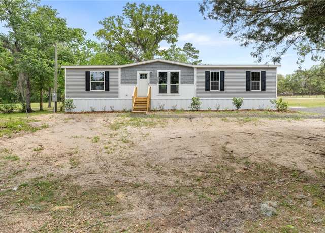 Property at 10850 NE 110th Ln, Archer, FL 32618, 3 beds, 2 baths