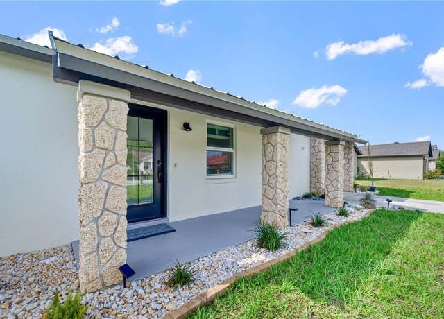 Property at 77 Freeport Ln, Palm Coast, FL 32137, 3 beds, 2 baths