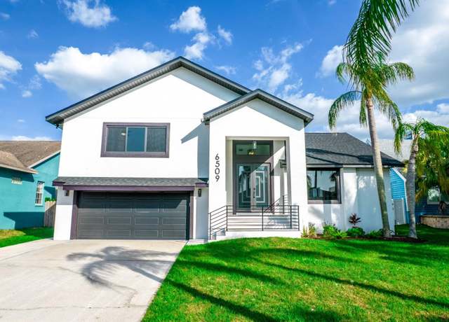 Property at 6509 Dolphin Cove Dr, Apollo Beach, FL 33572, 4 beds, 3.5 baths