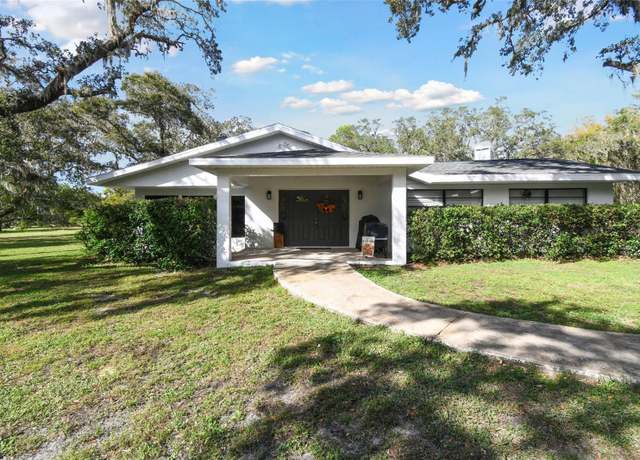 Property at 10208 Grove Dr, Port Richey, FL 34668, 4 beds, 3 baths