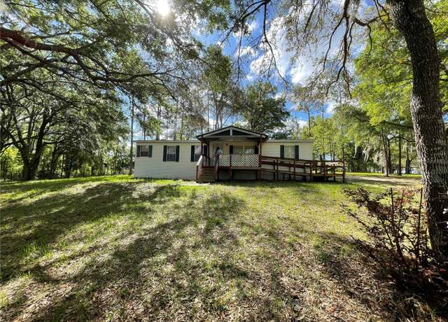 Property at 1550 SE 111th Ct, Morriston, FL 32668, 3 beds, 2 baths