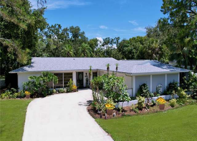 Property at 1861 Royal Oak Pl E, Dunedin, FL 34698, 5 beds, 4 baths