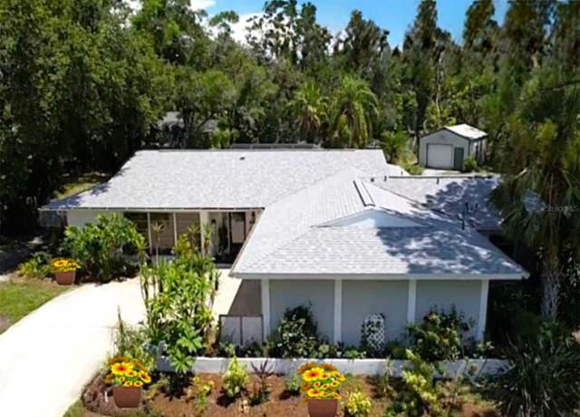 Property at 1861 Royal Oak Pl E, Dunedin, FL 34698, 5 beds, 4 baths
