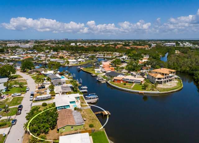 Property at 9439 Sun Isle Dr NE, St Petersburg, FL 33702, 4 beds, 2 baths