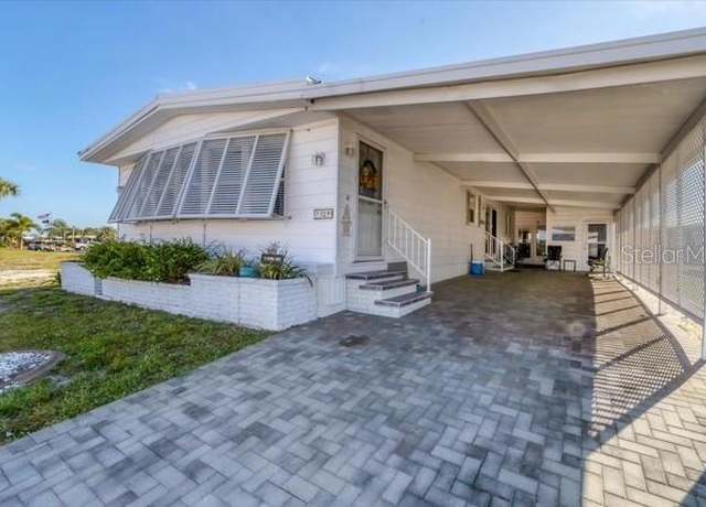 Property at 12 Hacienda Dr, Englewood, FL 34223, 2 beds, 2 baths
