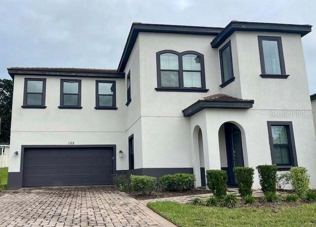 Property at 122 Macaulays Cv, Haines City, FL 33844, 3 beds, 3.5 baths