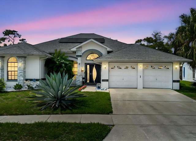 Property at 9301 Tournament Dr, Hudson, FL 34667, 3 beds, 3.5 baths
