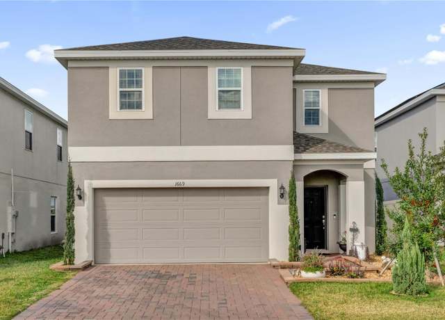Property at 1669 Swan Swim Dr, Davenport, FL 33837, 4 beds, 2 baths