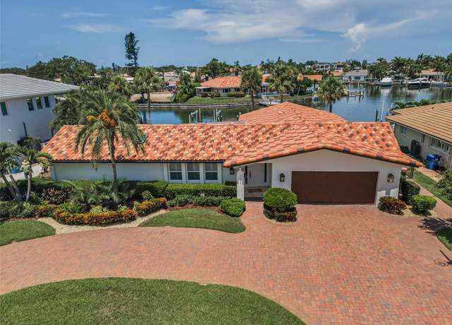 Property at 2057 Kansas Ave NE, St Petersburg, FL 33703, 4 beds, 3 baths