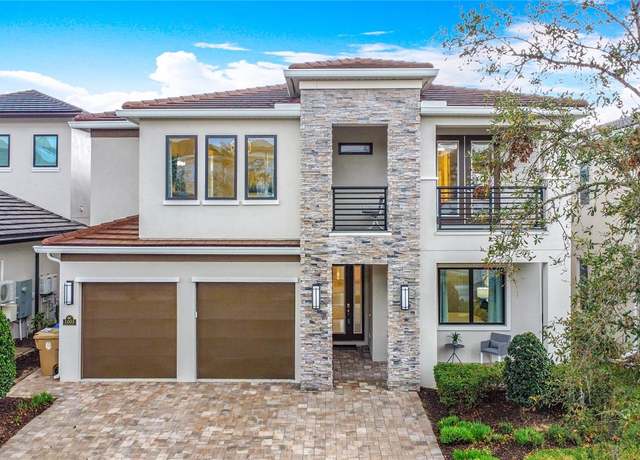 Property at 1003 Jack Nicklaus Ct, Kissimmee, FL 34747, 6 beds, 6.5 baths