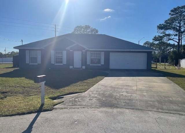 Property at 14 Random Pl, Palm Coast, FL 32164, 4 beds, 2 baths