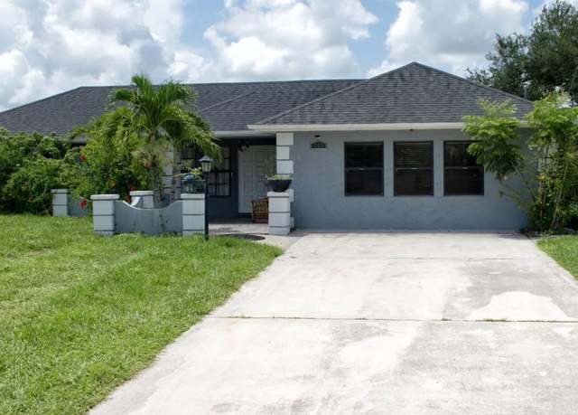 Property at 706 E 4th St, Lehigh Acres, FL 33936, 3 beds, 2.5 baths