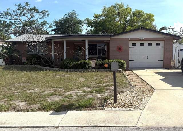 Property at 3302 Eisenhower Dr, Holiday, FL 34691, 3 beds, 2 baths