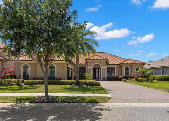 Property at 1013 Stella Vara Dr, Lutz, FL 33548, 4 beds, 3.5 baths