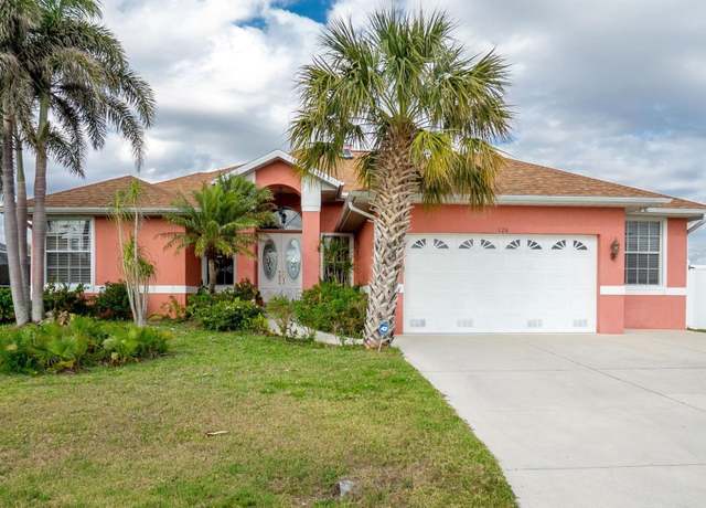 Property at 126 Peckham St SW, Port Charlotte, FL 33952, 4 beds, 3 baths
