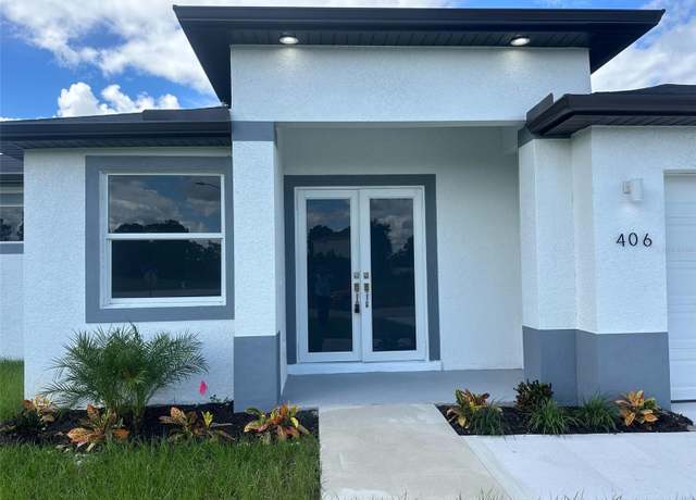 Property at 406 Genoa Ave S, Lehigh Acres, FL 33974, 3 beds, 2.5 baths