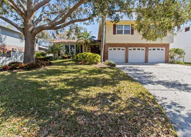 Property at 8555 140th St, Seminole, FL 33776, 4 beds, 3 baths