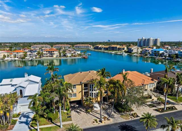 Property at 6015 Kipps Colony Dr E, Gulfport, FL 33707, 5 beds, 4.5 baths