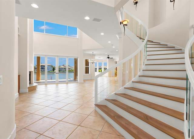 Property at 6015 Kipps Colony Dr E, Gulfport, FL 33707, 5 beds, 4.5 baths