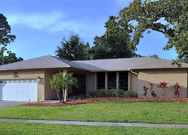 Property at 915 Rolling Hills Dr, Palm Harbor, FL 34683, 4 beds, 3 baths