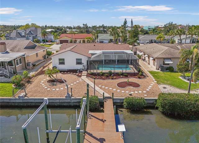 Property at 709 Flamingo Dr, Apollo Beach, FL 33572, 4 beds, 2 baths