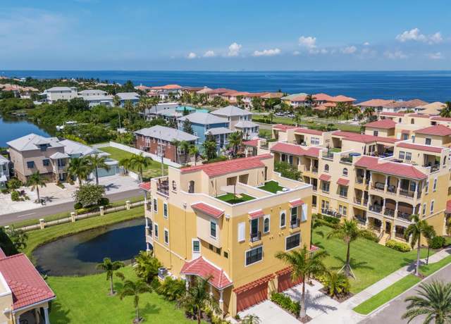 Property at 1450 Silvia Shores Dr, Apollo Beach, FL 33572, 4 beds, 3.5 baths