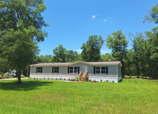Property at 10931 NE 98th Ln, Archer, FL 32618, 4 beds, 2 baths