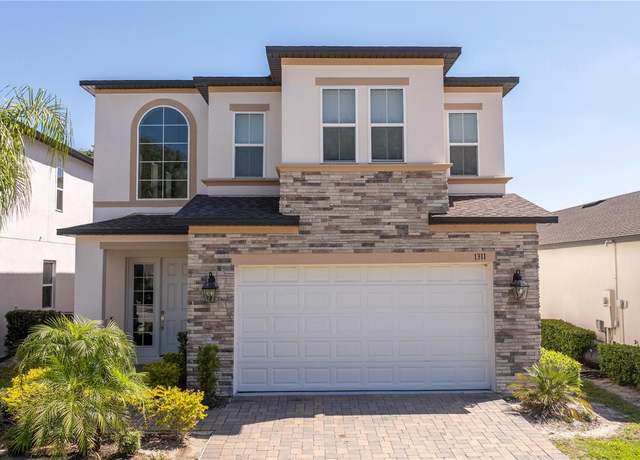 Property at 1311 Arisha Dr, Kissimmee, FL 34746, 5 beds, 4.5 baths