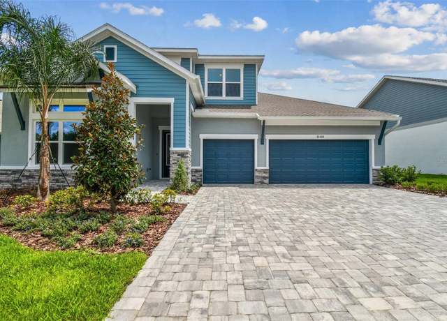 Property at 31418 Hayman Loop, Wesley Chapel, FL 33545, 4 beds, 4 baths
