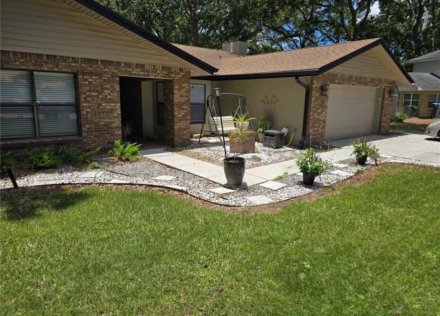 Property at 909 Heatherbrook Dr, Auburndale, FL 33823, 4 beds, 2.5 baths