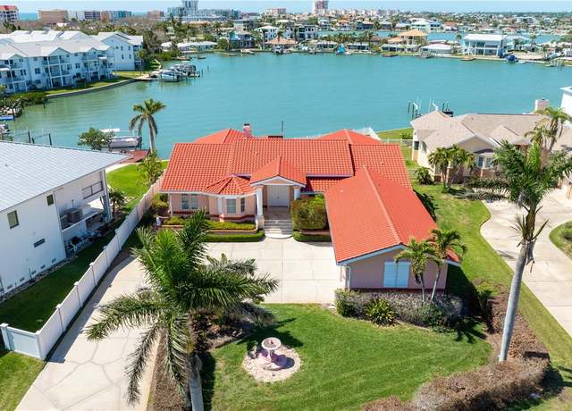 Property at 320 Bath Club Blvd S, North Redington Beach, FL 33708, 6 beds, 4.5 baths