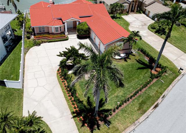Property at 320 Bath Club Blvd S, North Redington Beach, FL 33708, 6 beds, 4.5 baths