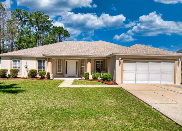 Property at 20 Burning Wick Pl, Palm Coast, FL 32137, 4 beds, 2 baths