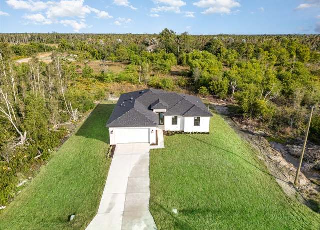 Property at 5952 Royal Okley Ln, Bokeelia, FL 33922, 3 beds, 2 baths
