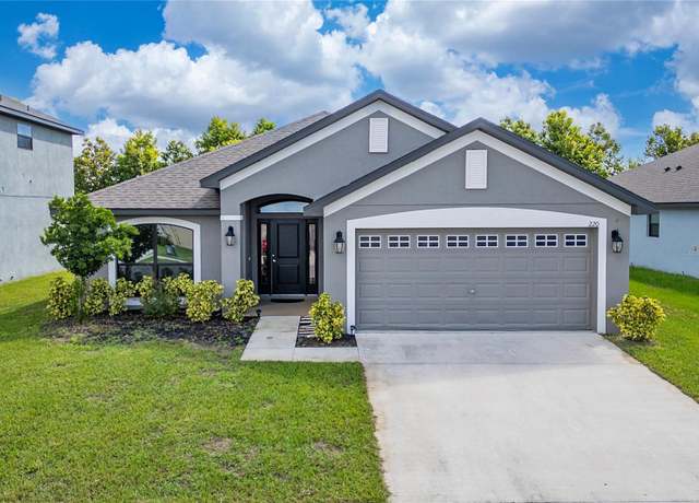 Property at 220 Bergamot Loop, Davenport, FL 33837, 4 beds, 2 baths