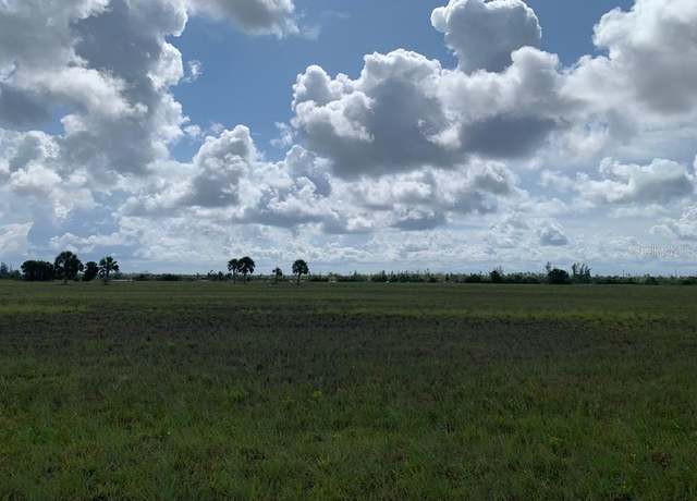 Property at 12 Sapsucker Dr, Placida, FL 33946