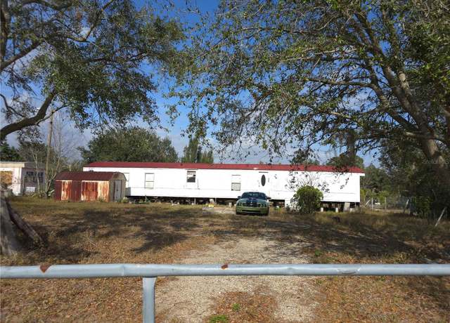 Property at 306 Mystery House Rd, Davenport, FL 33837, 3 beds, 2 baths