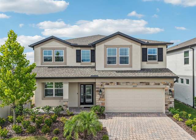 Property at 33157 Rosewood Bark Way, Wesley Chapel, FL 33545, 5 beds, 4 baths