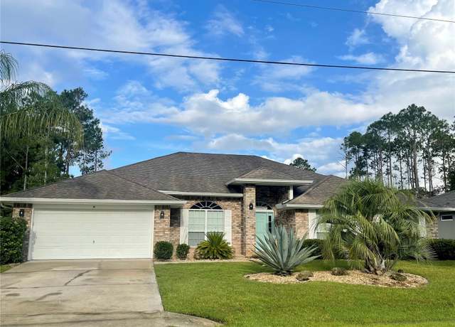 Property at 14 Roxanne Ln, Palm Coast, FL 32164, 4 beds, 3 baths