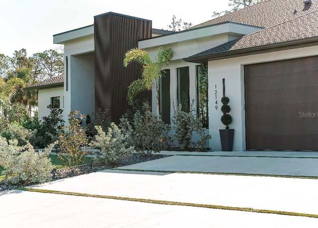 Property at 12149 Chapman Ave, Port Charlotte, FL 33953, 4 beds, 3.5 baths