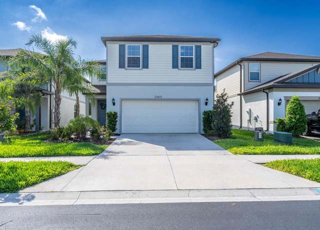 Property at 20472 Monza Loop, Land O Lakes, FL 34638, 5 beds, 3 baths