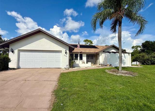 Property at 648 Myra Ln NW, Port Charlotte, FL 33948, 3 beds, 2 baths