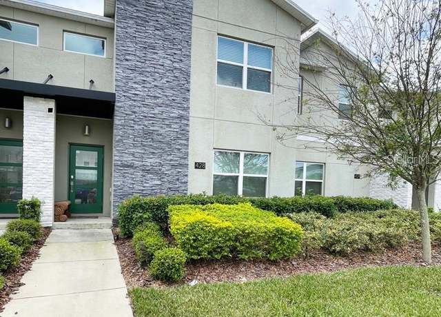 Property at 428 Ocean Course Ave, Davenport, FL 33896, 4 beds, 3 baths