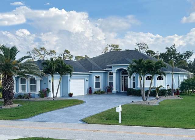 Property at 1061 Boundary Blvd, Rotonda West, FL 33947, 4 beds, 2.5 baths