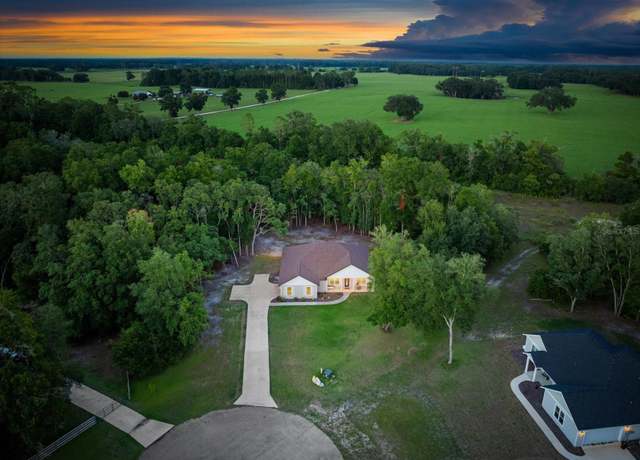 Property at 8920 NE 8th Pl, High Springs, FL 32643, 4 beds, 3 baths