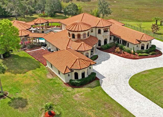 Property at 11158 Warm Wind Way, Weeki Wachee, FL 34613, 5 beds, 6.5 baths