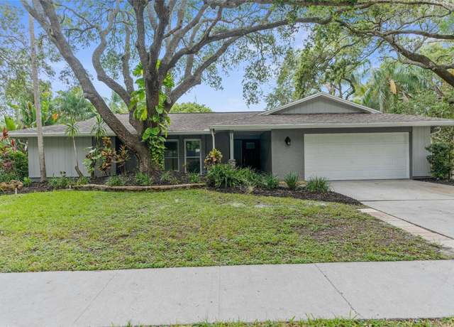 Property at 939 Woodland Dr, Palm Harbor, FL 34683, 4 beds, 3 baths
