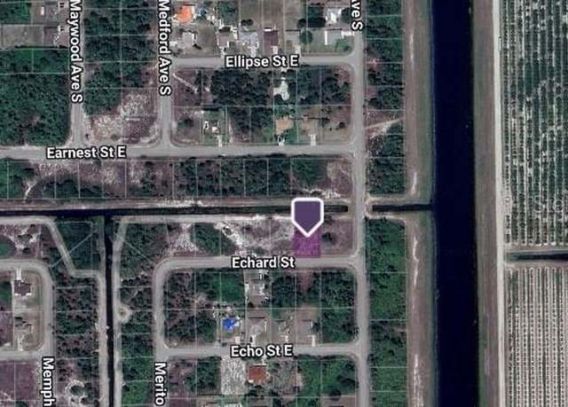 Property at 1251 Echard St E, Lehigh Acres, FL 33974