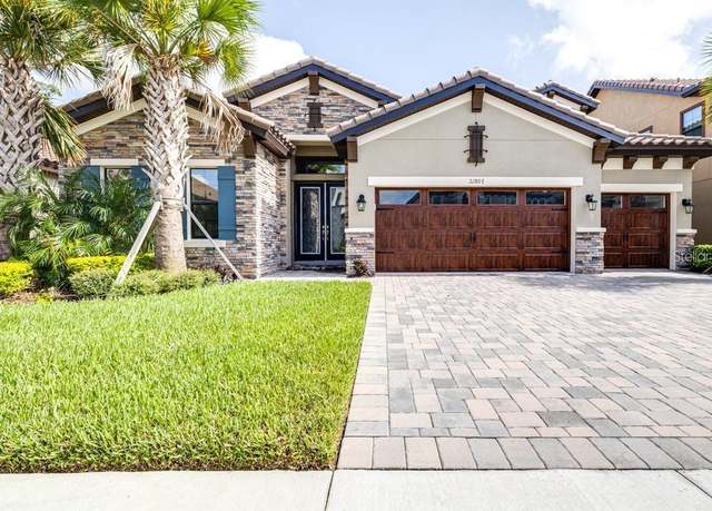 Property at 21807 Amelia Rose Way, Land O Lakes, FL 34637, 5 beds, 4 baths